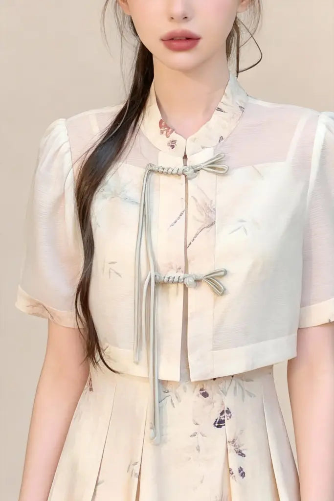 Woman wearing a Traditional Chinese Two-Piece Set - Butterfly Print Slip Dress with Short Sleeve Jacket against a plain background