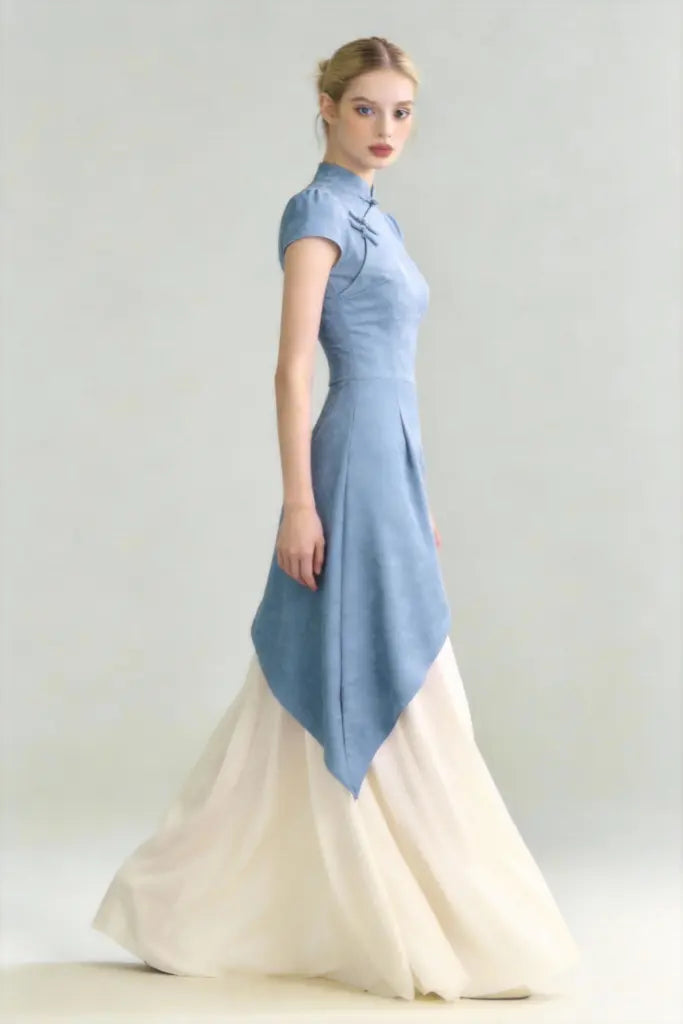 Woman wearing Modern Chinese Qipao Dress - Blue and White Paneled Elegant Maxi Dress on a gray background