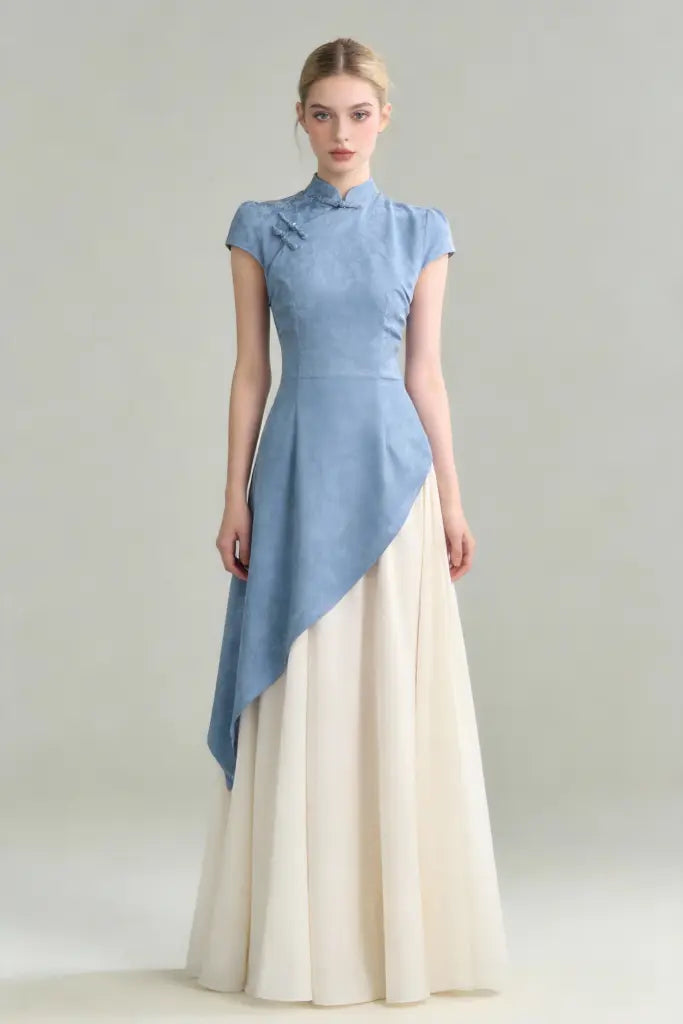 Woman wearing Modern Chinese Qipao Dress - Blue and White Paneled Elegant Maxi Dress on a gray background