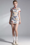 Woman wearing a Chinese Dragon Print Short Qipao Dress - Traditional Cheongsam with Modern Twist with a plain background