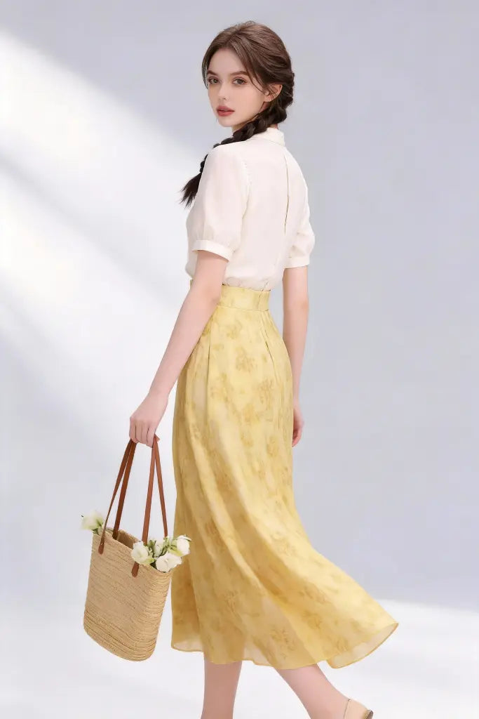 Woman wearing Beige Stand-Collar Blouse + Yellow Floral Midi Skirt, Elegant Spring Summer Two-Piece Set on a plain background