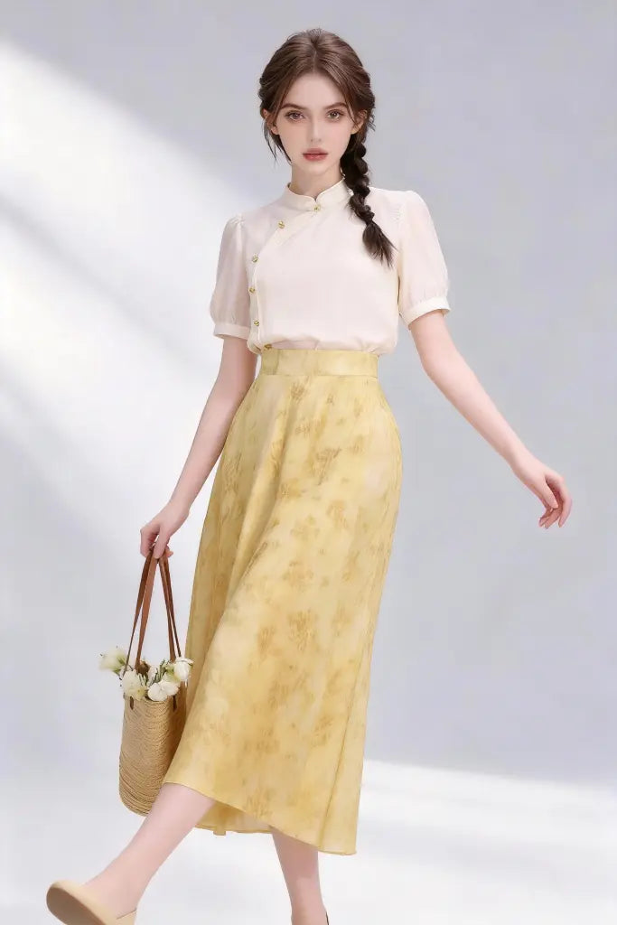 Woman wearing Beige Stand-Collar Blouse + Yellow Floral Midi Skirt, Elegant Spring Summer Two-Piece Set on a plain background