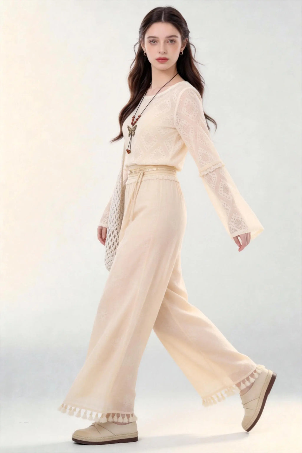Woman in a beige Spring Summer New Ancient Style Hollow Lace Top High Waist Straight Wide Leg Pants Daily Versatile Two-Piece Set  against a white background
