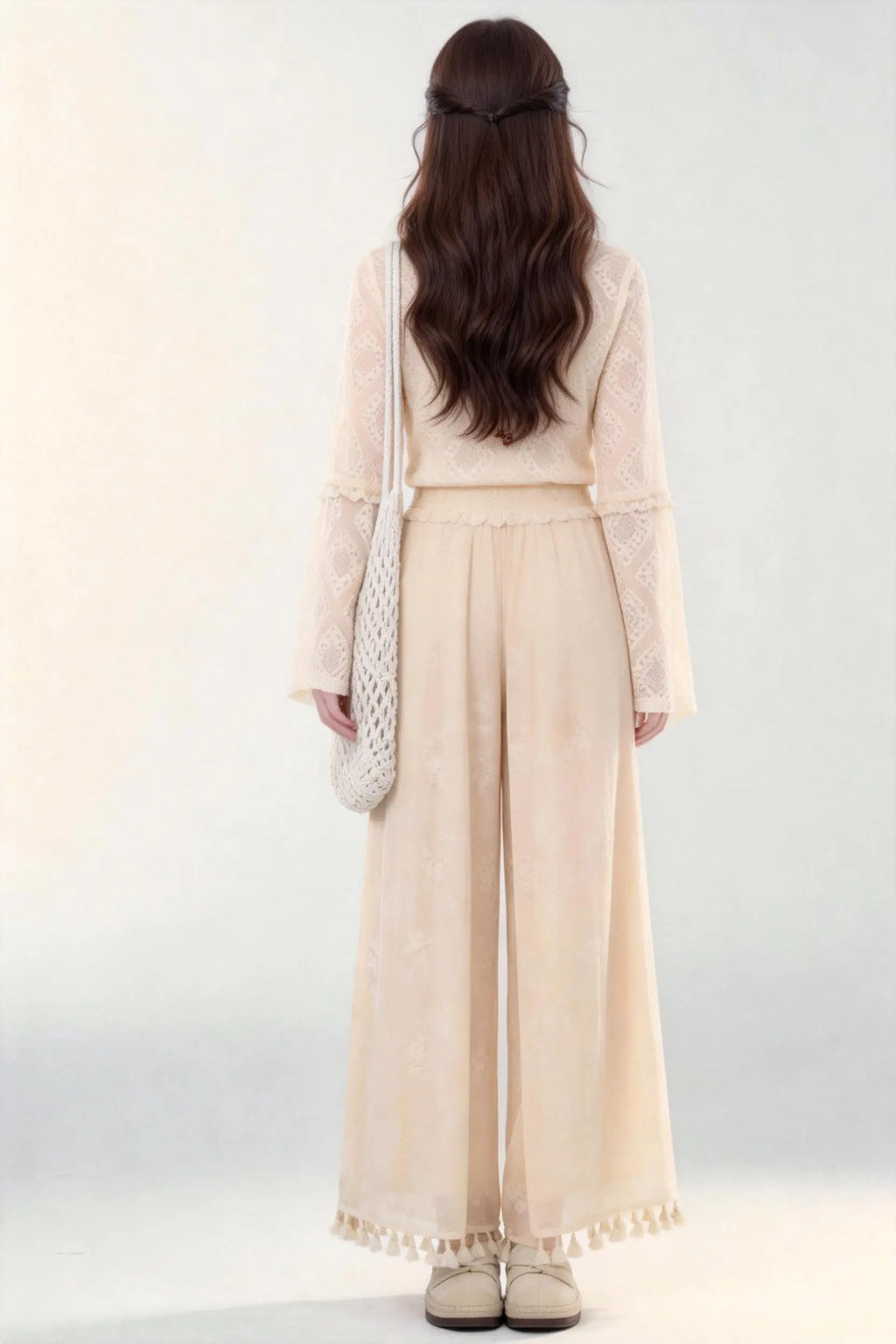 Woman in a beige Spring Summer New Ancient Style Hollow Lace Top High Waist Straight Wide Leg Pants Daily Versatile Two-Piece Set  against a white background