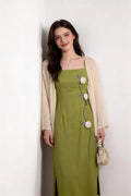 Woman wearing a Sage Green Rose Appliqu¨¦ Slip Dress with Sheer Cream Cardigan against a white background