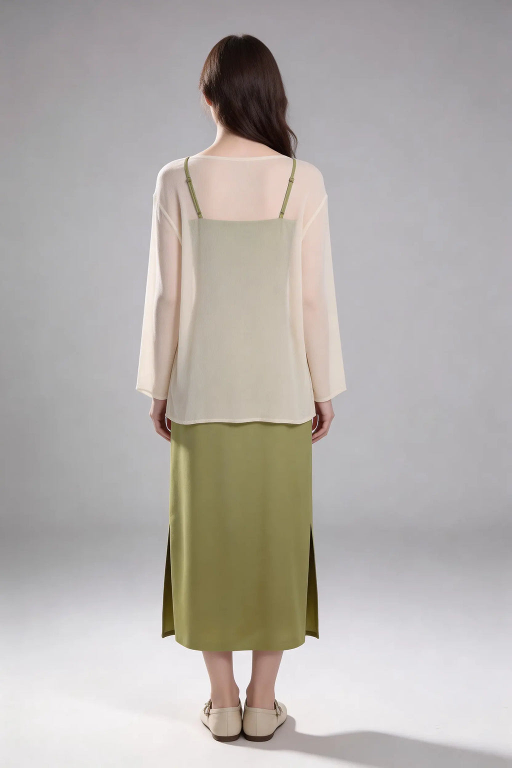 Woman wearing a Sage Green Rose Appliqu¨¦ Slip Dress with Sheer Cream Cardigan against a white background