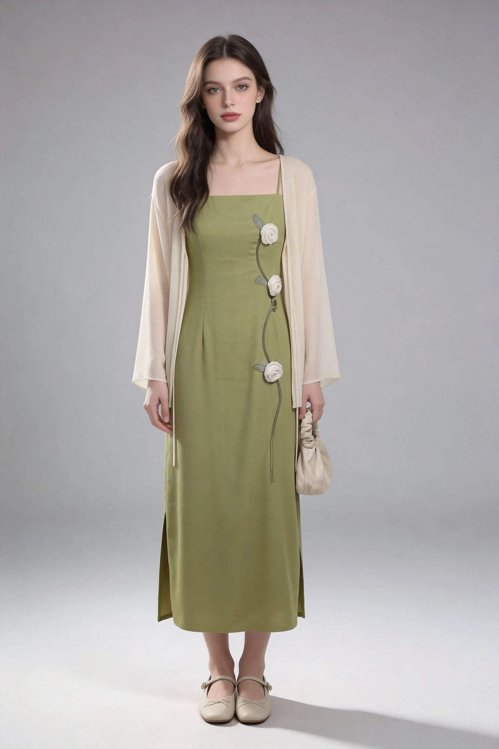 Woman wearing a Sage Green Rose Appliqu¨¦ Slip Dress with Sheer Cream Cardigan against a white background