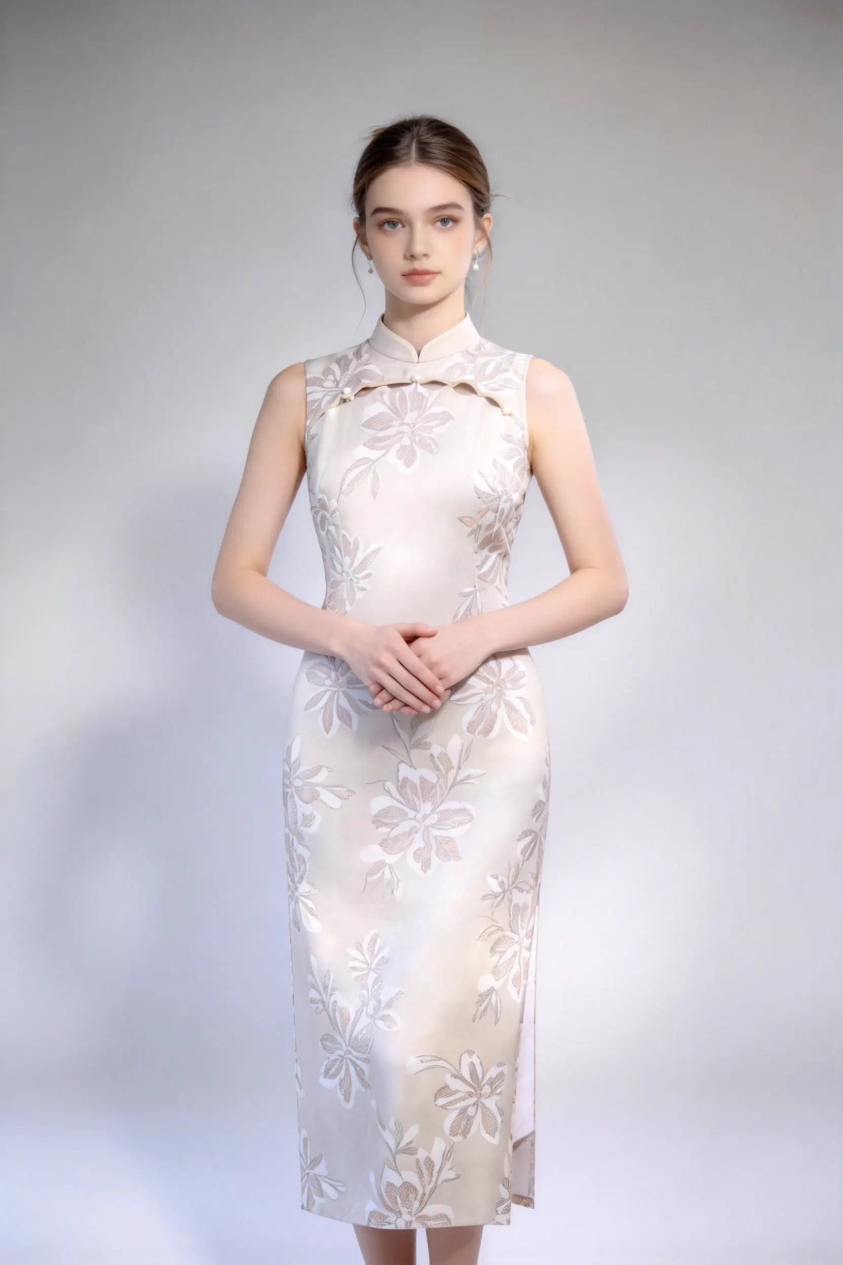 Woman wearing sleeveless floral embroidery cheongsam with cutout frog buttons, double-lined mandarin collar qipao dress against a plain background
